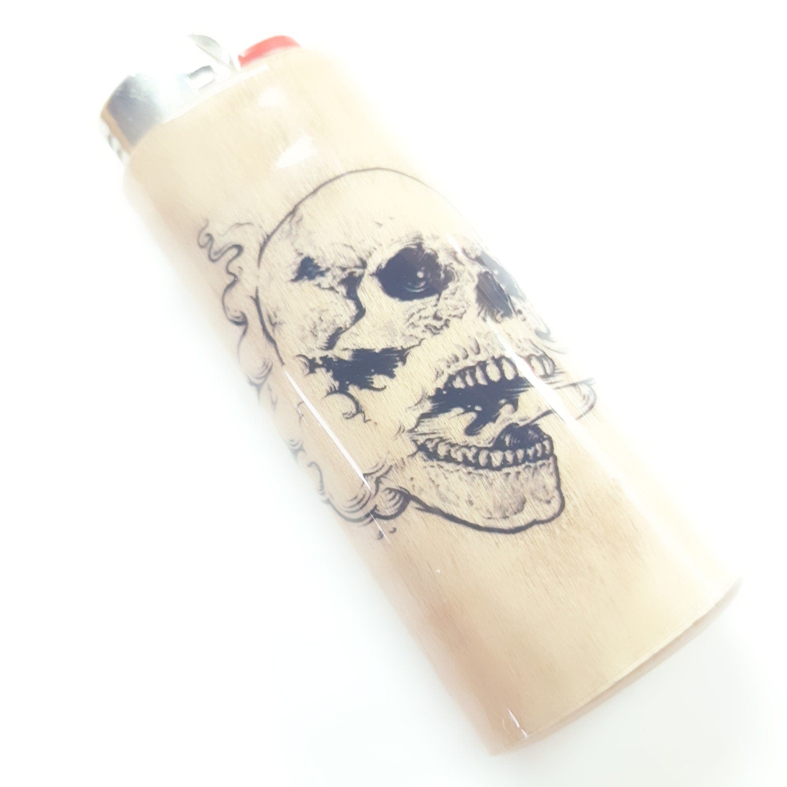 Lighter with a skull design on a white background