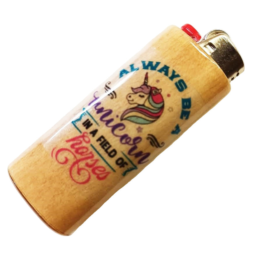 Lighter with unicorn design and text on a white background