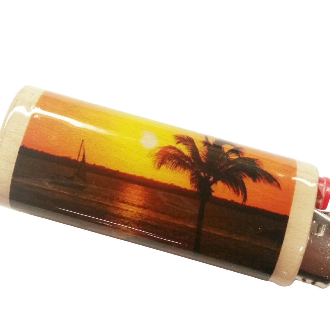 Lighter with a sunset design featuring a palm tree and sailboat on a white background