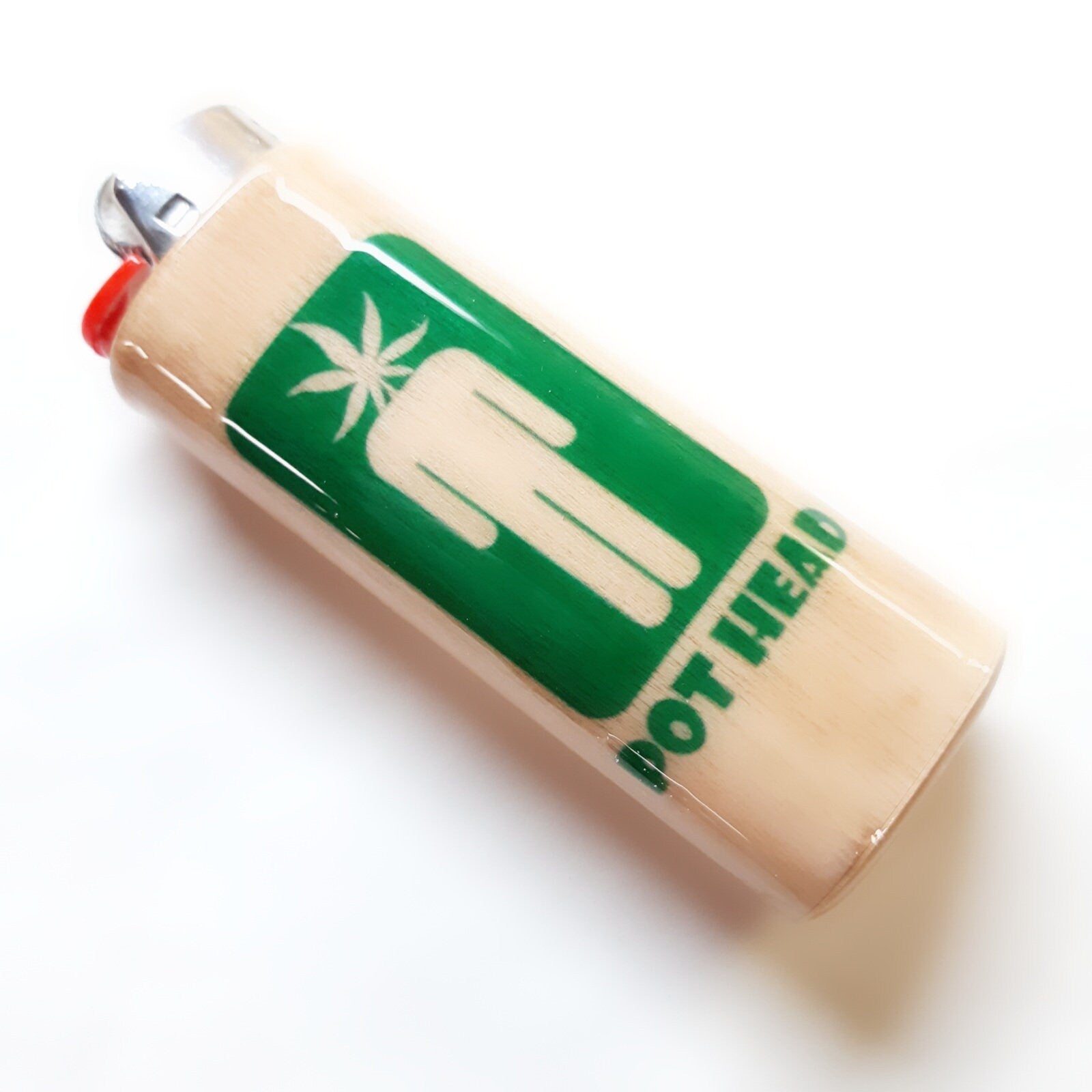 Lighter with 'Pot Head' branding and a cannabis leaf symbol on a white background