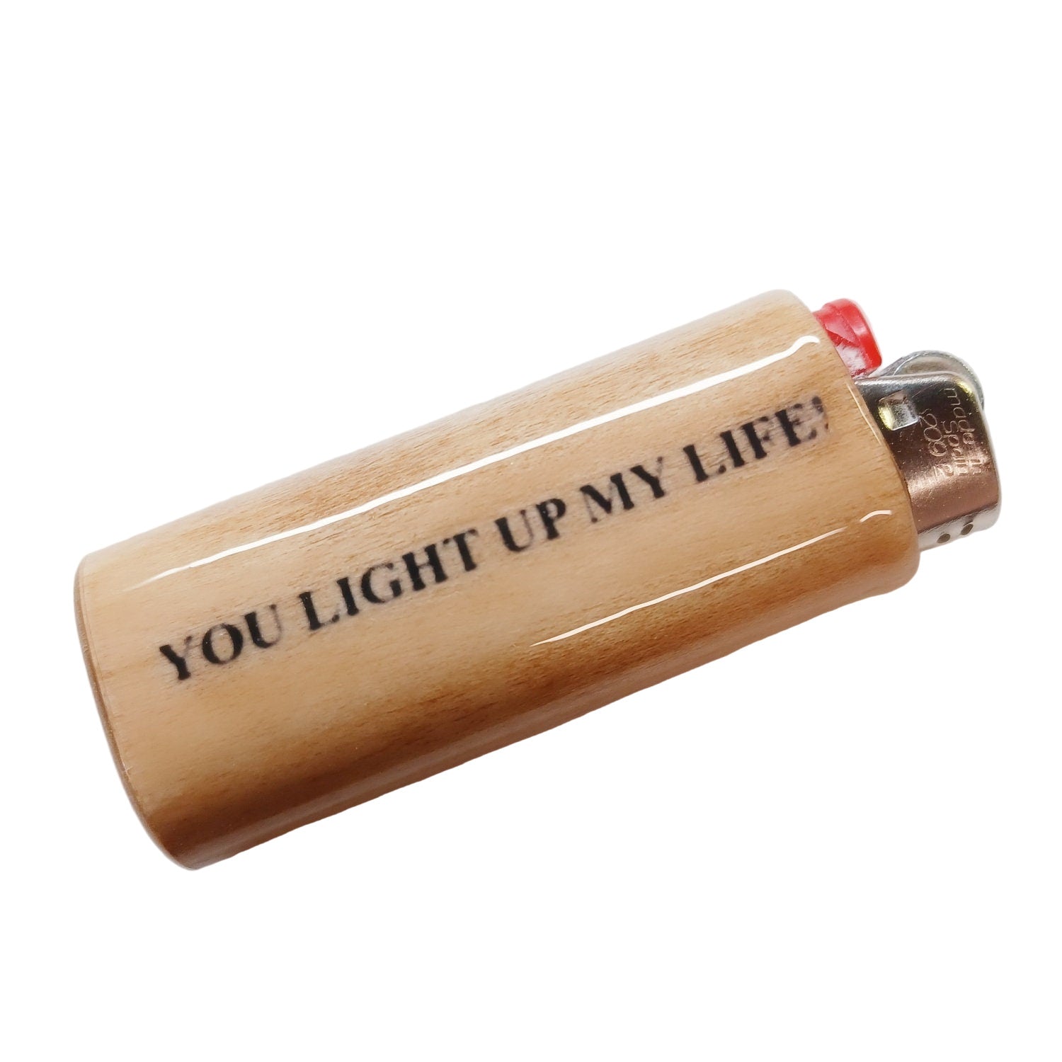 Lighter with 'YOU LIGHT UP MY LIFE!' text on a white background