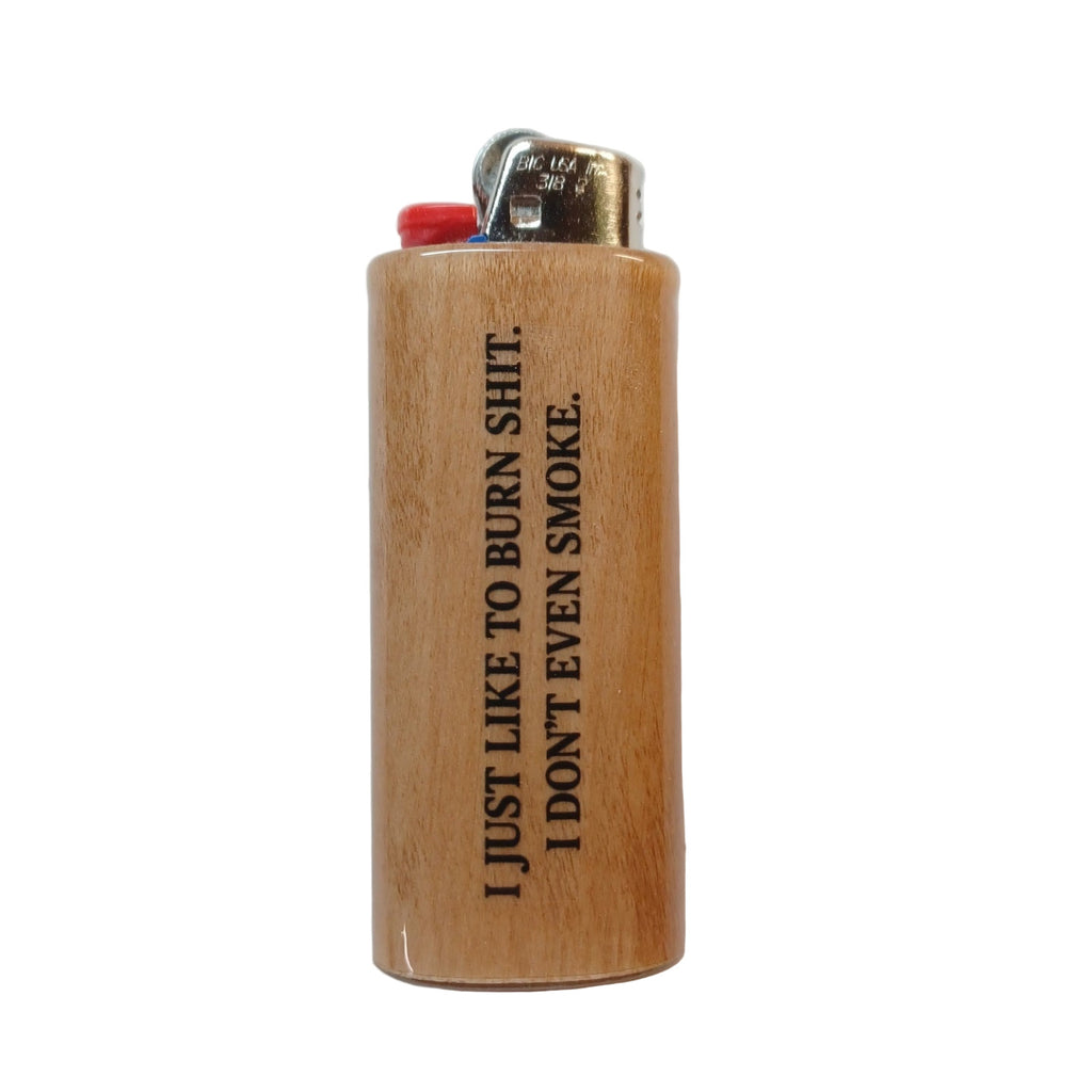 Wooden lighter with humorous text on a white background