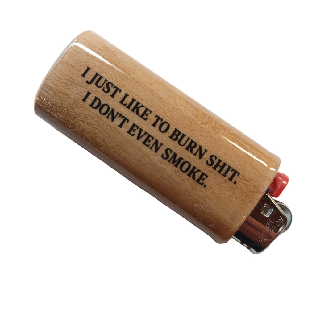 Wooden lighter with humorous text on a white background