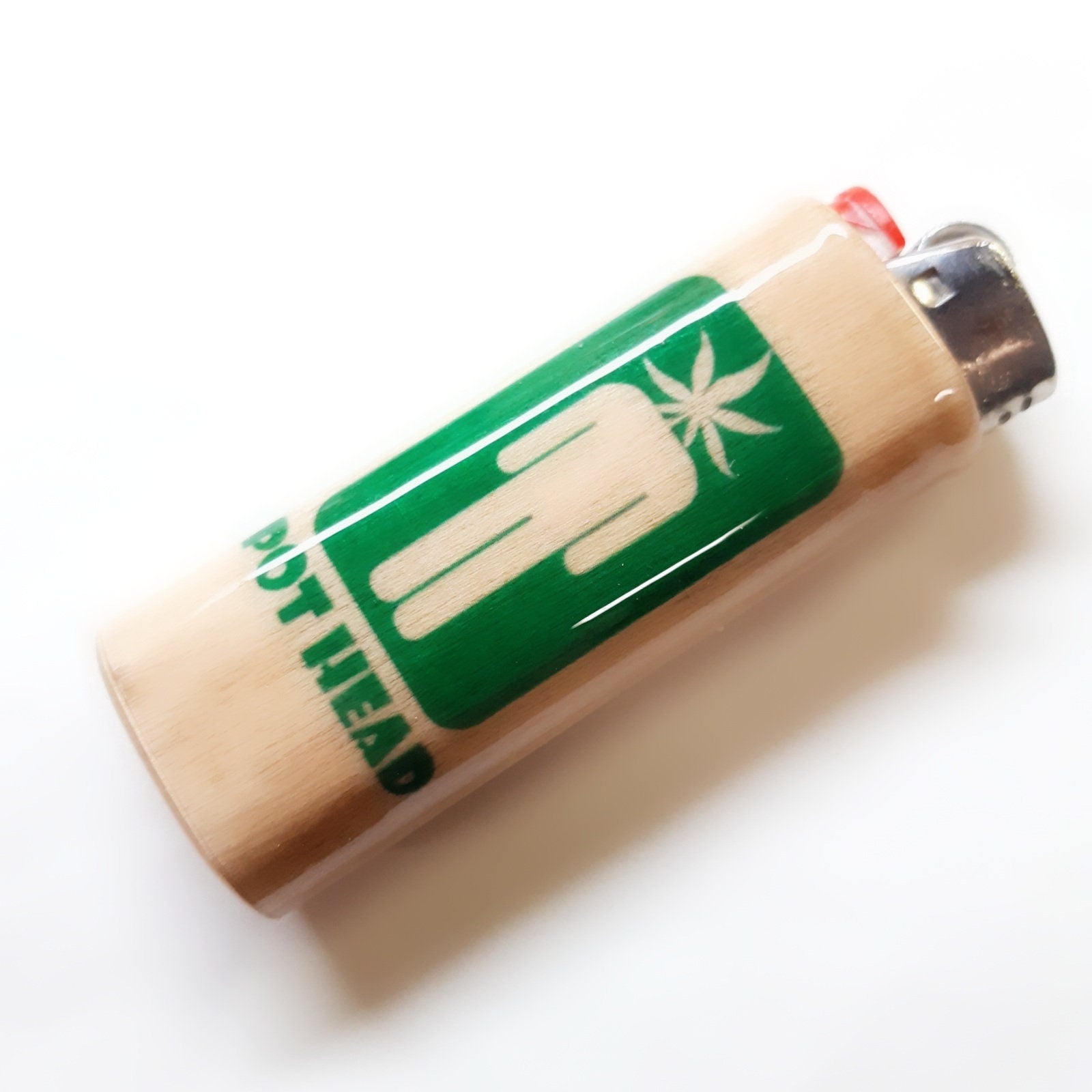 Lighter with 'Pot Head' branding and a cannabis leaf symbol on a white background