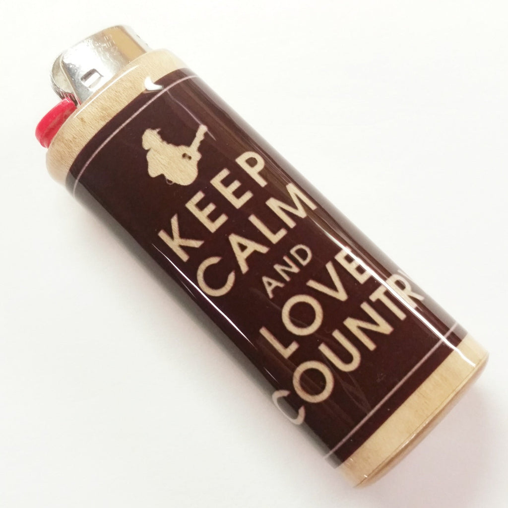 Lighter with 'Keep Calm and Love Country Music' text on a white background