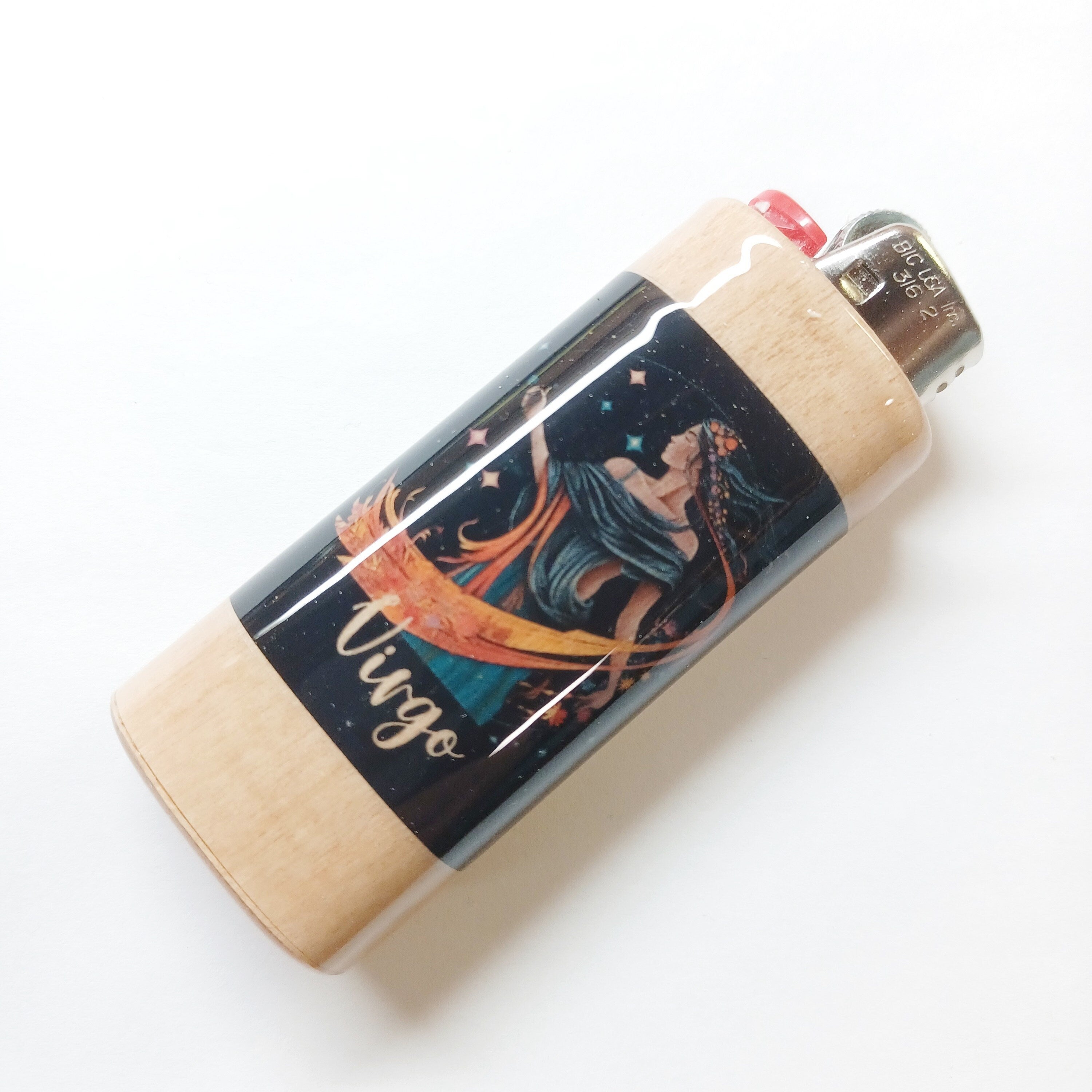Lighter with Virgo zodiac design on a white background