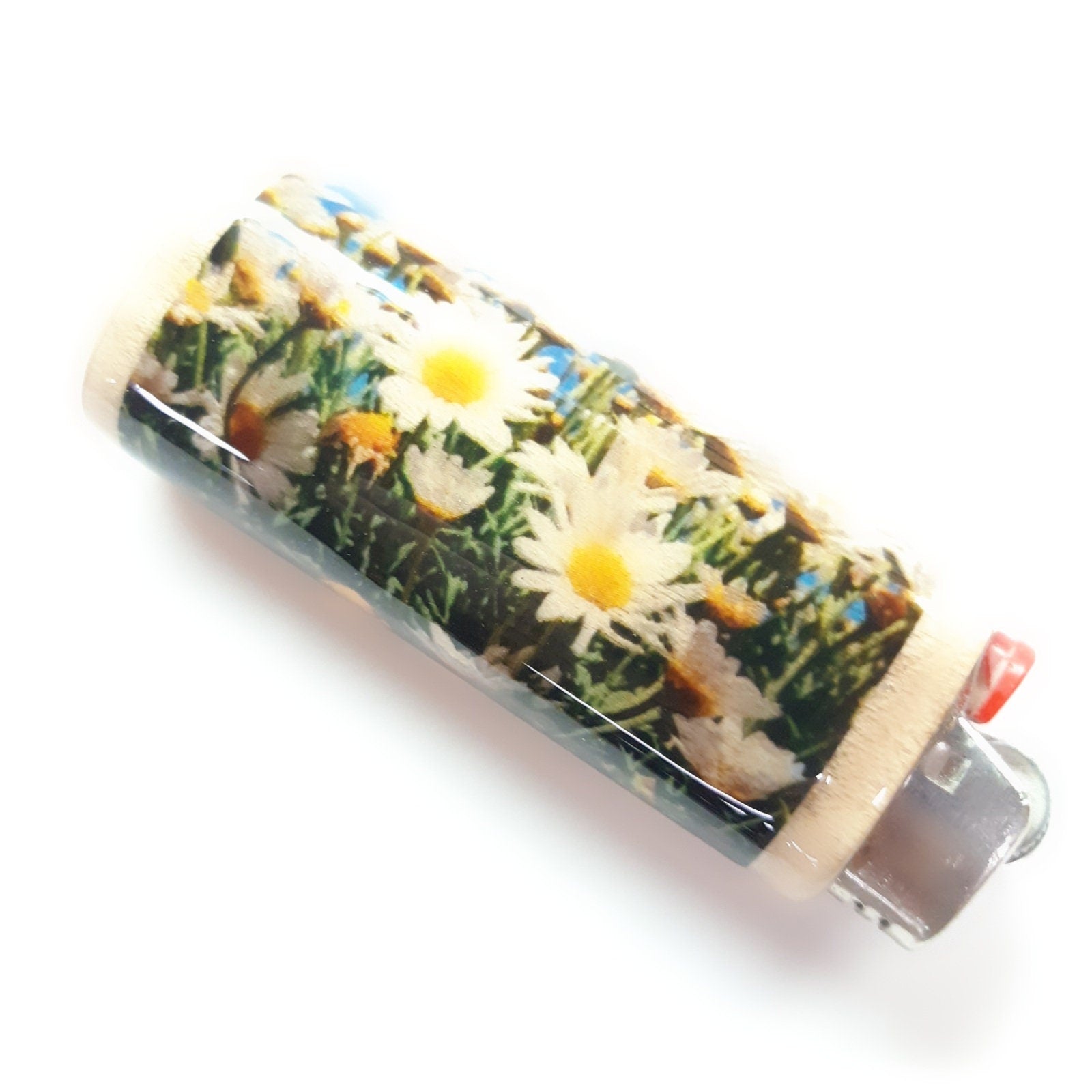Daisy-patterned lighter on a white background