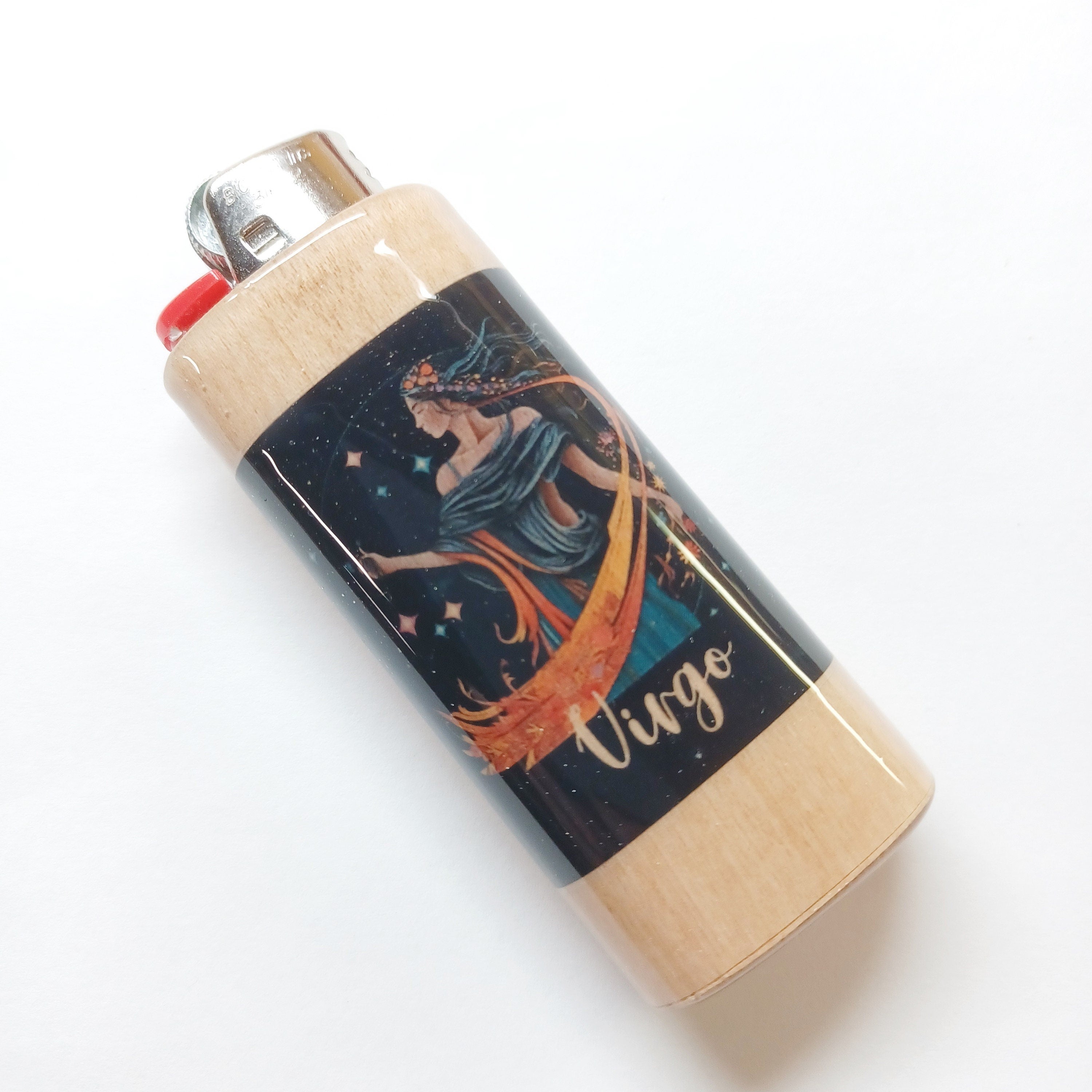 Lighter with 'Vigo' design on a white background