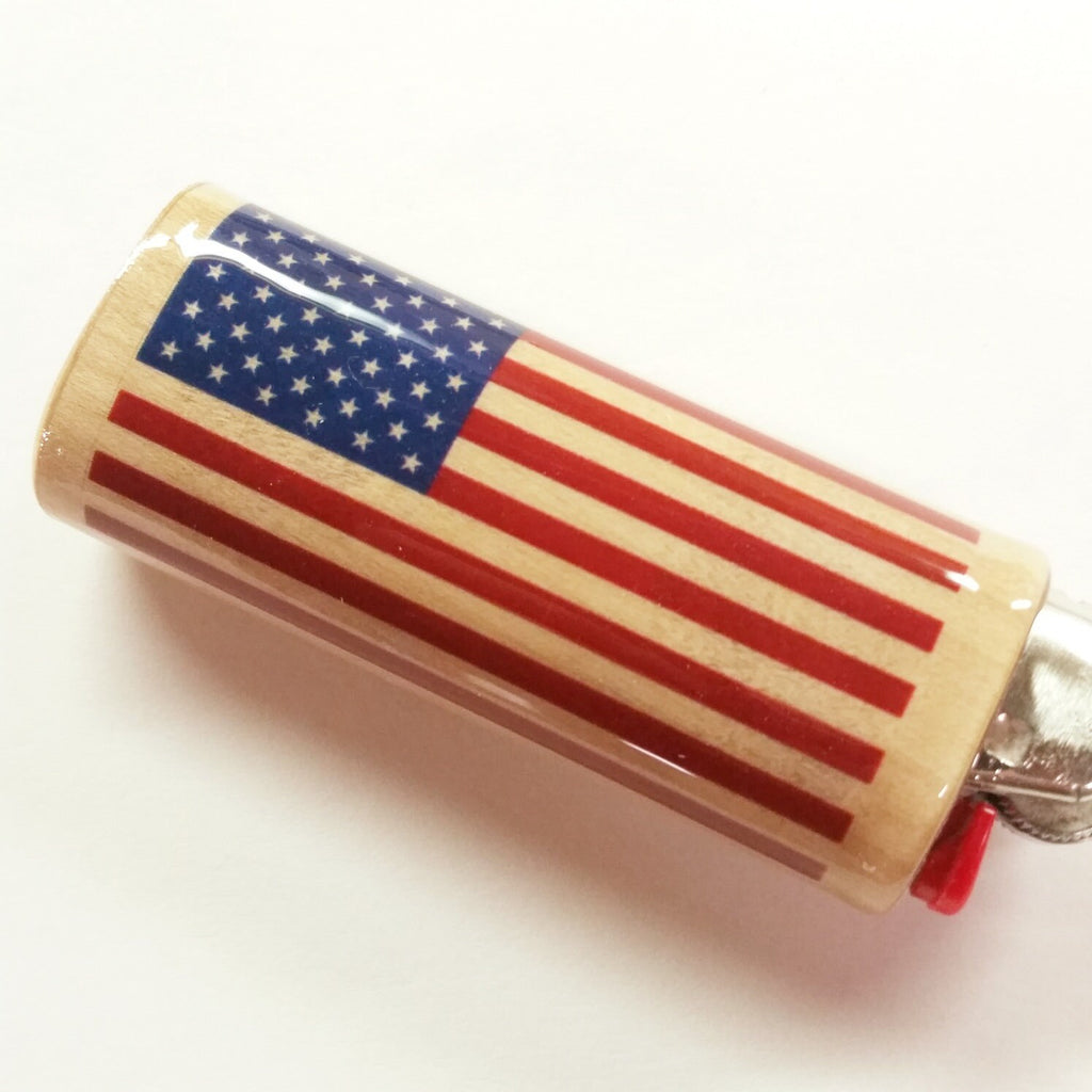 Lighter with American flag design on a white background
