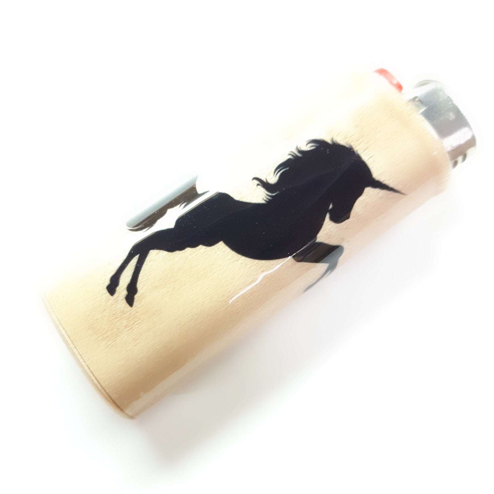 Lighter cover with a black unicorn on a beige background