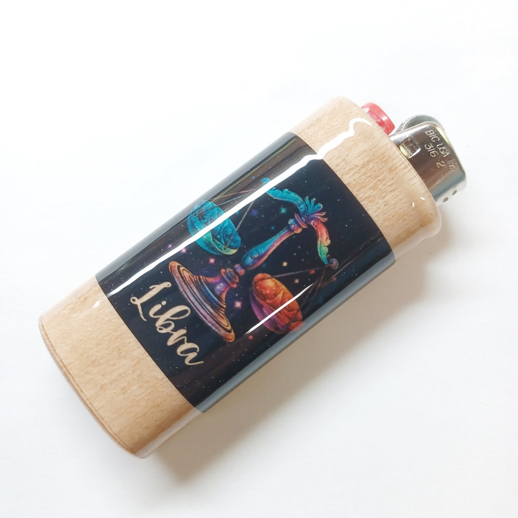 Lighter with colorful astrological design and 'Libra' text on a white background