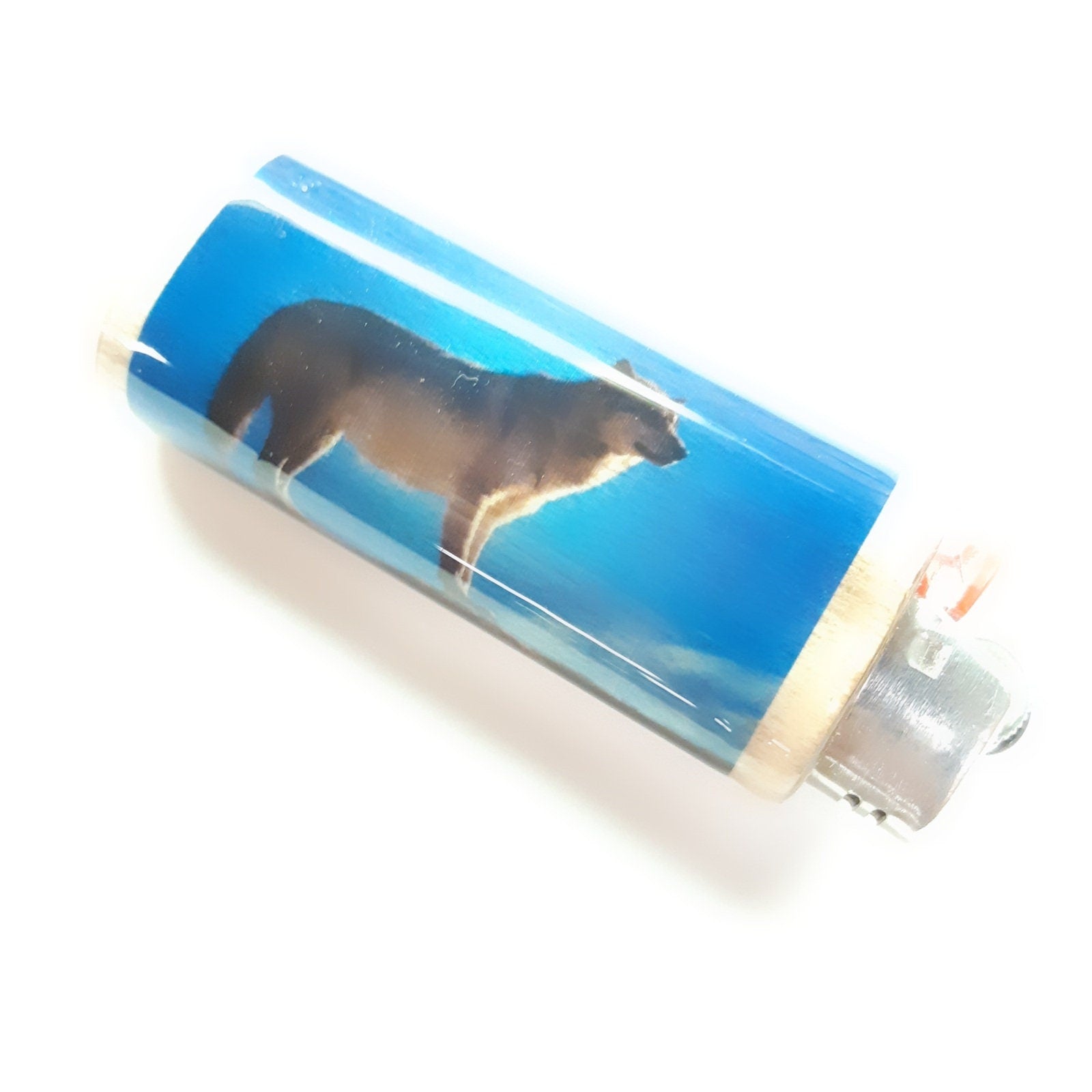 Lighter case with a wolf design on a white background
