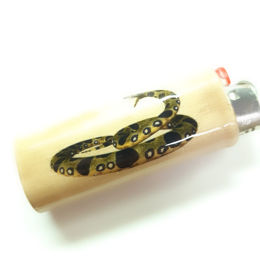 Lighter with a snake design on a white background