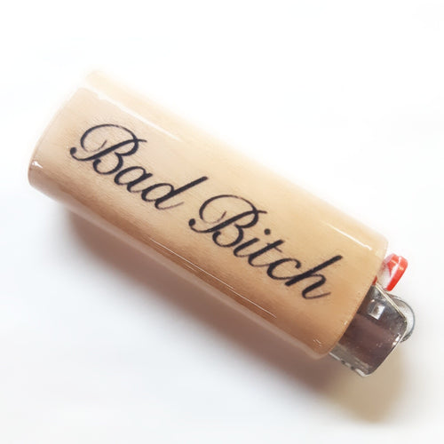 Lighter with 'Bad Bitch' text on a white background