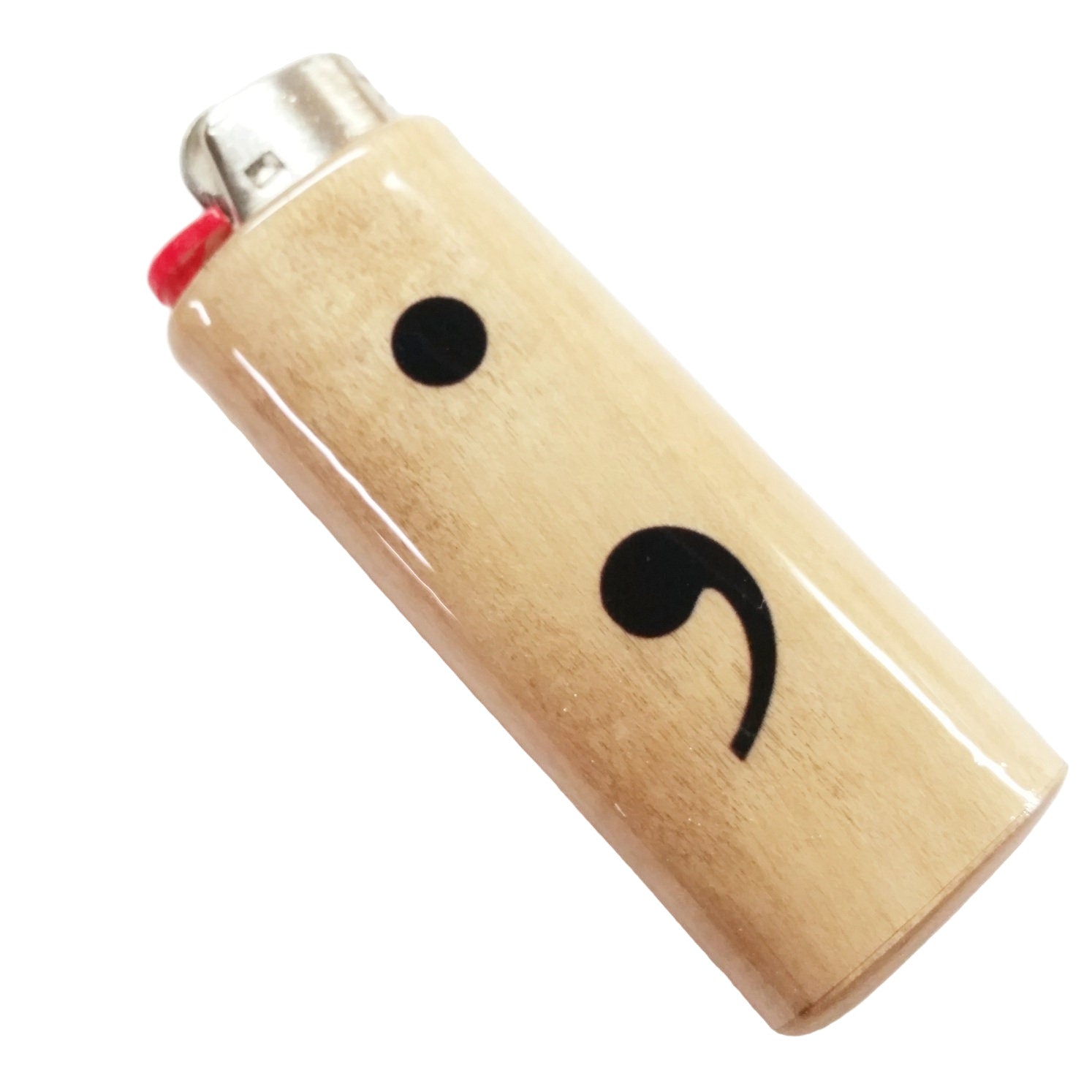 Wooden lighter with a black semicolon symbol on a white background