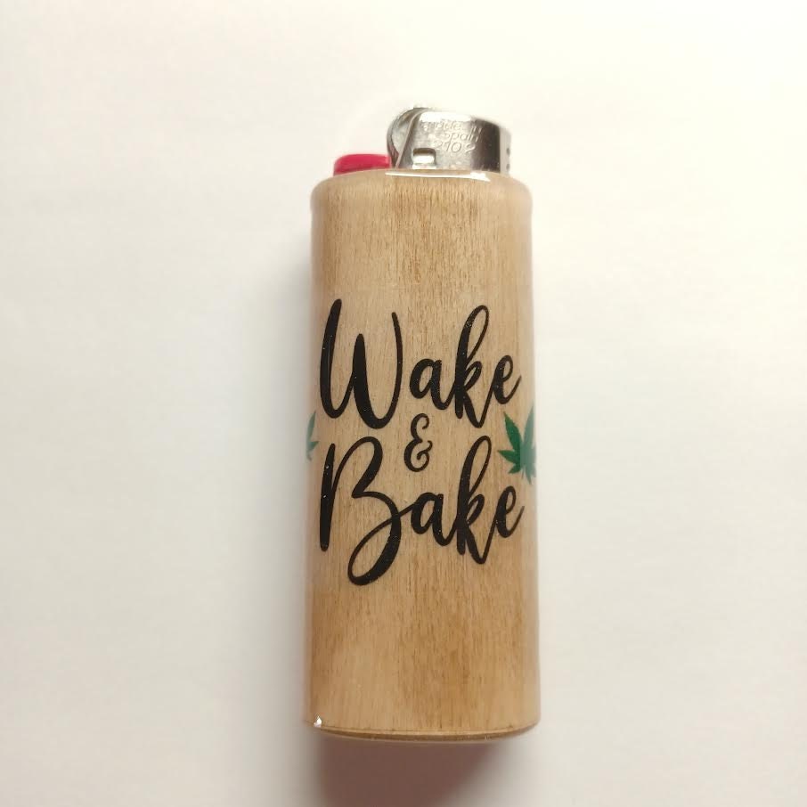 Wooden lighter with 'Wake & Bake' text on a white background