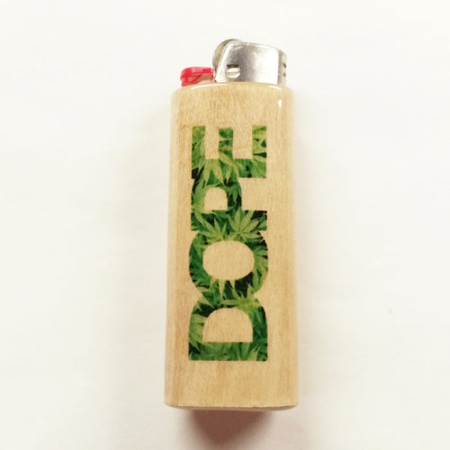 Lighter with cannabis leaf design on a beige background