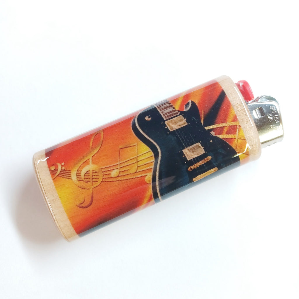 Lighter with guitar and music notes design on a white background