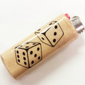 Lighter with dice design on a white background