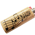 Wooden lighter with musical notes design on a white background