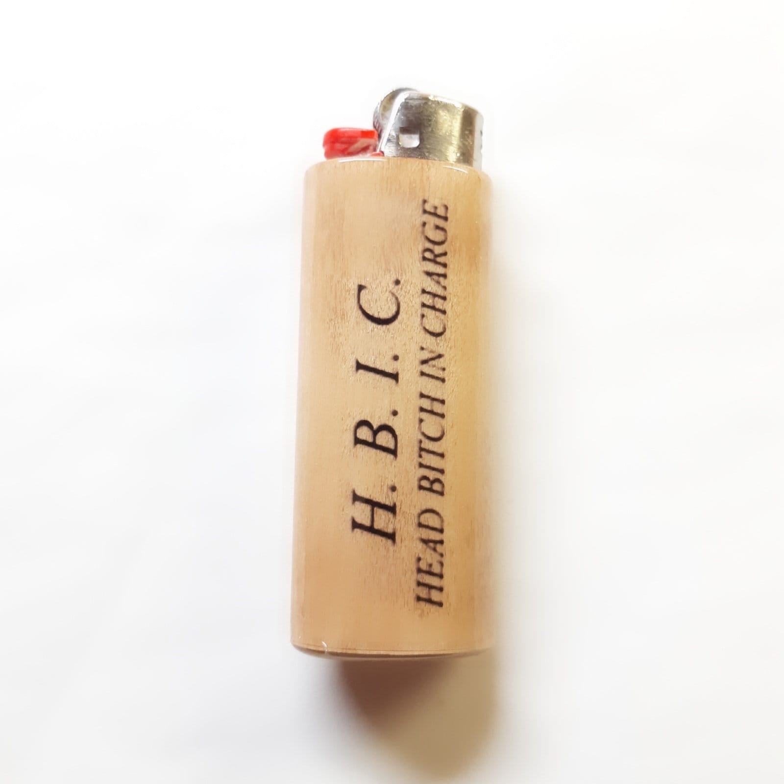 Lighter with 'H. B. I. C. HEAD BITCH IN CHARGE' text on a white background