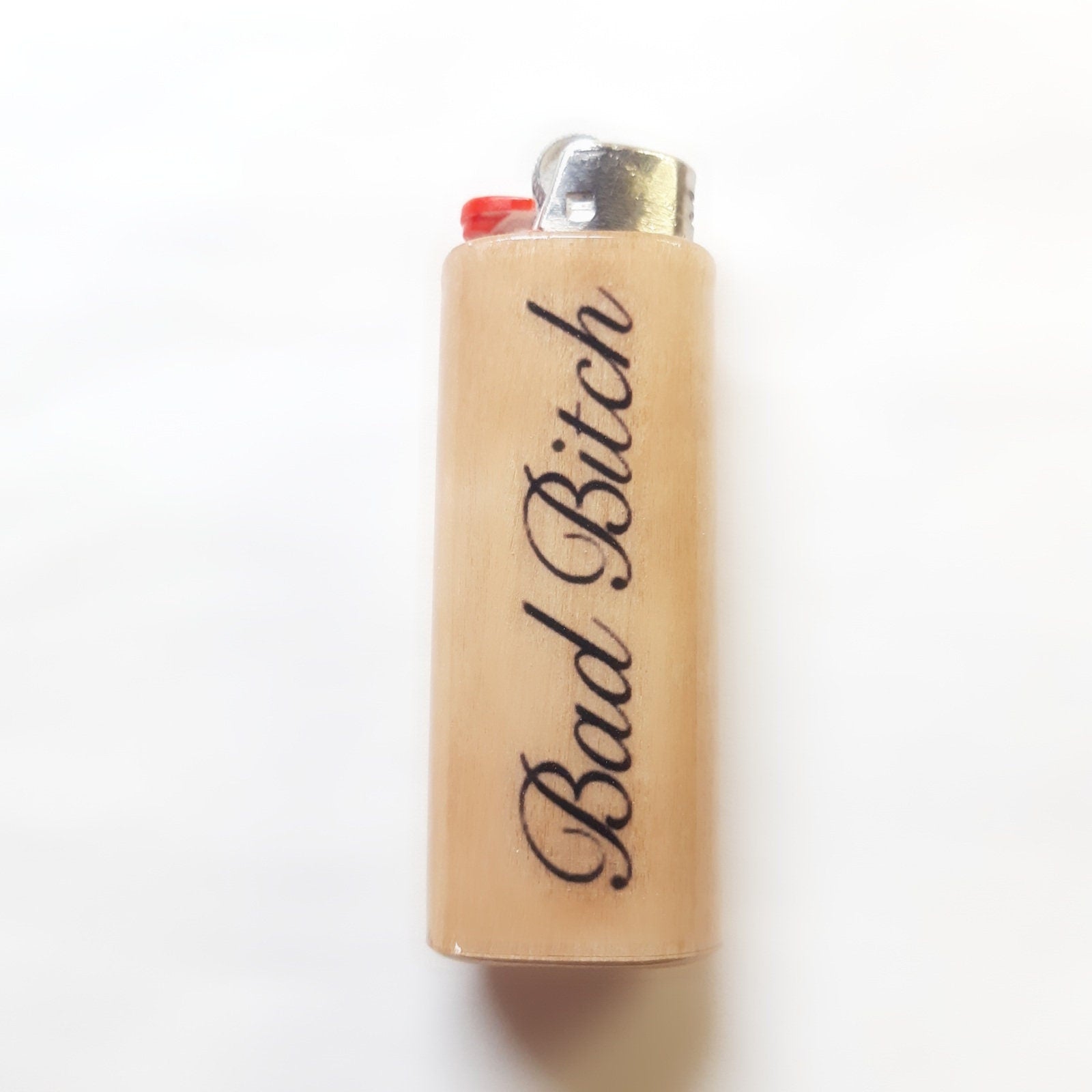 Lighter with 'Bad Bitch' text on a white background