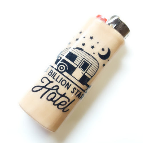 Lighter with '5 Billion Star Hotel' design on a white background