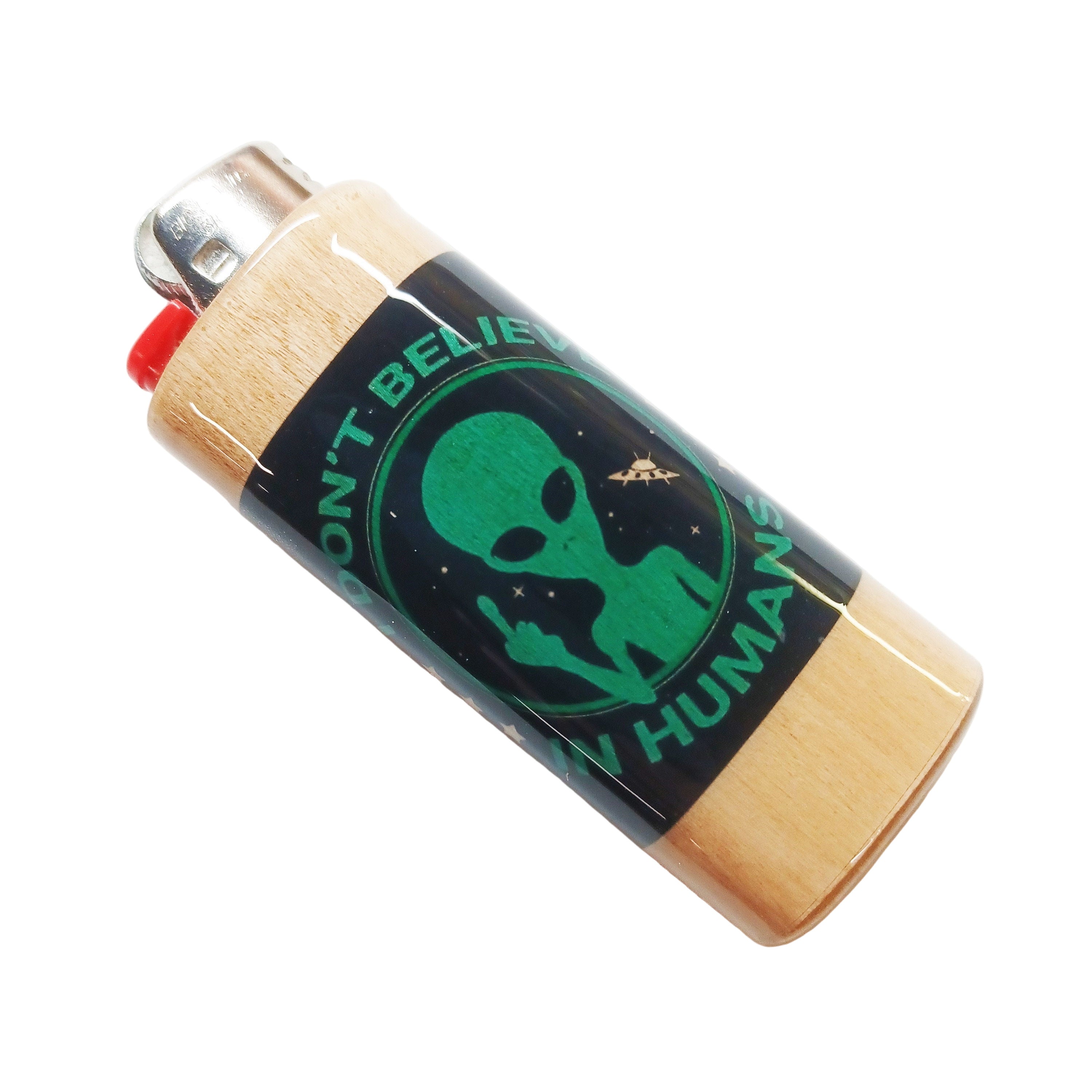 Lighter with alien design and text on a white background