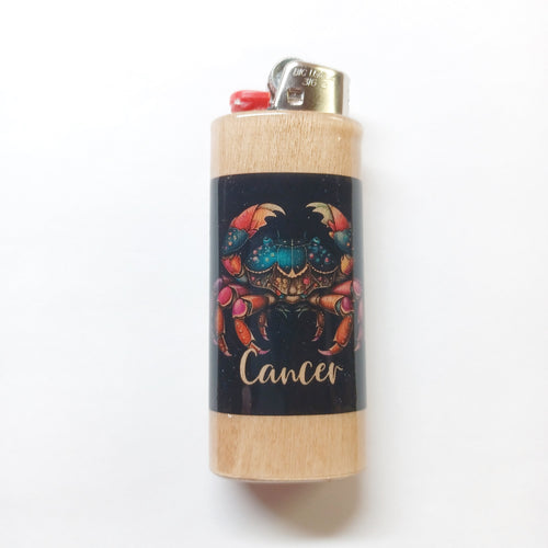 Lighter with Cancer zodiac design on a white background