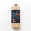 Lighter with Pisces design on a white background