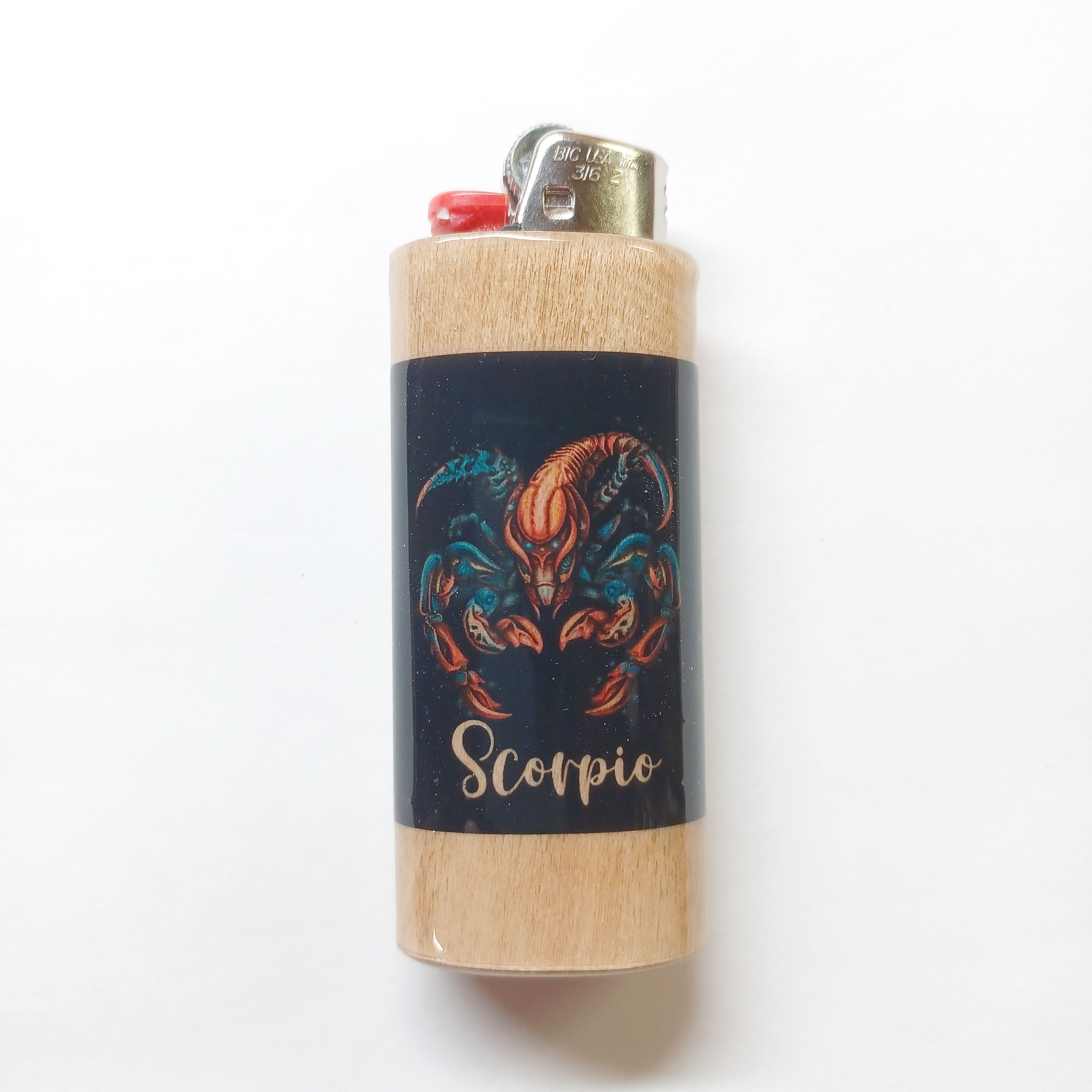 Lighter with Scorpio design on a white background