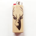 Wooden lighter with deer head design on a white background