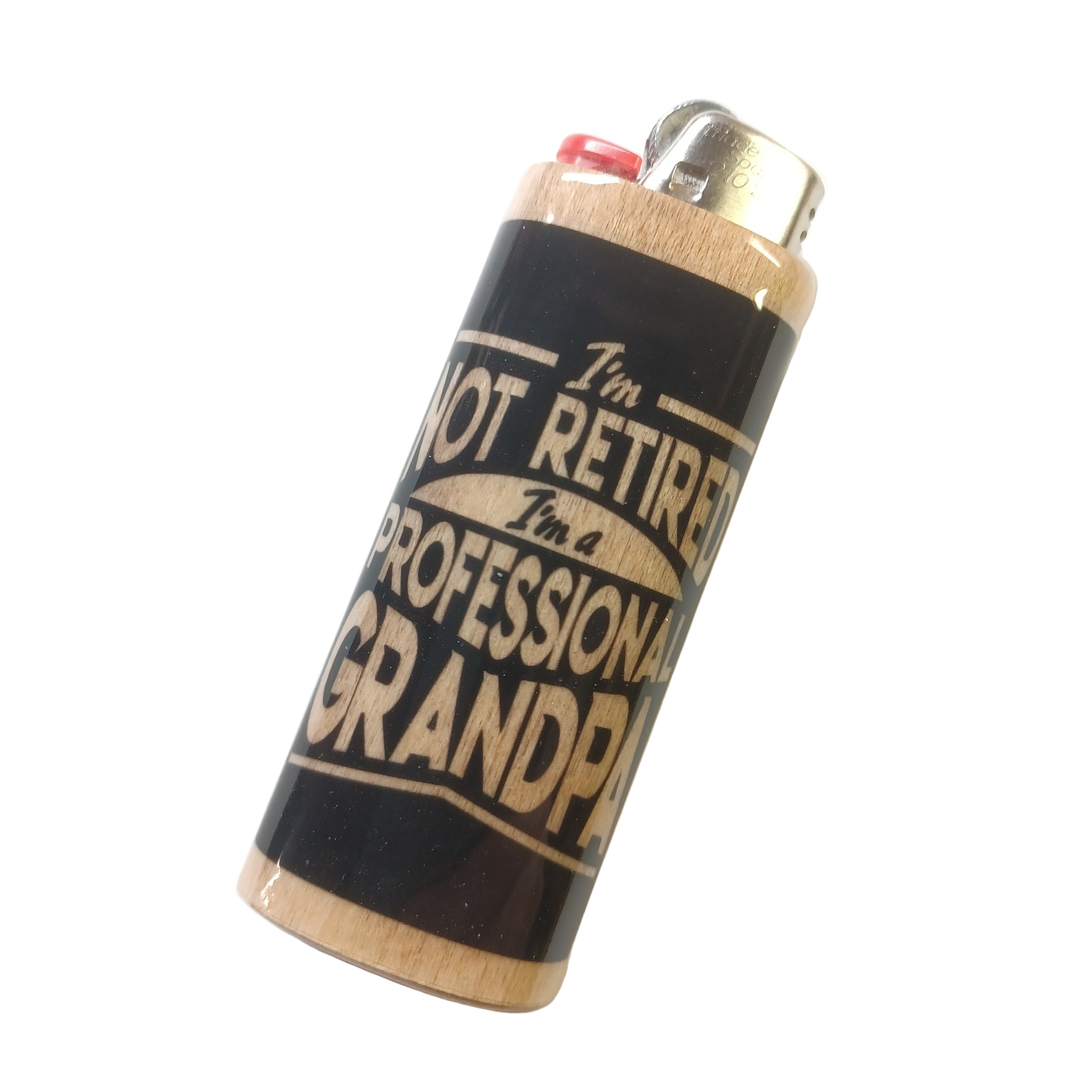 Lighter with humorous text 'I'm not retired, I'm a professional grandpa' on a white background