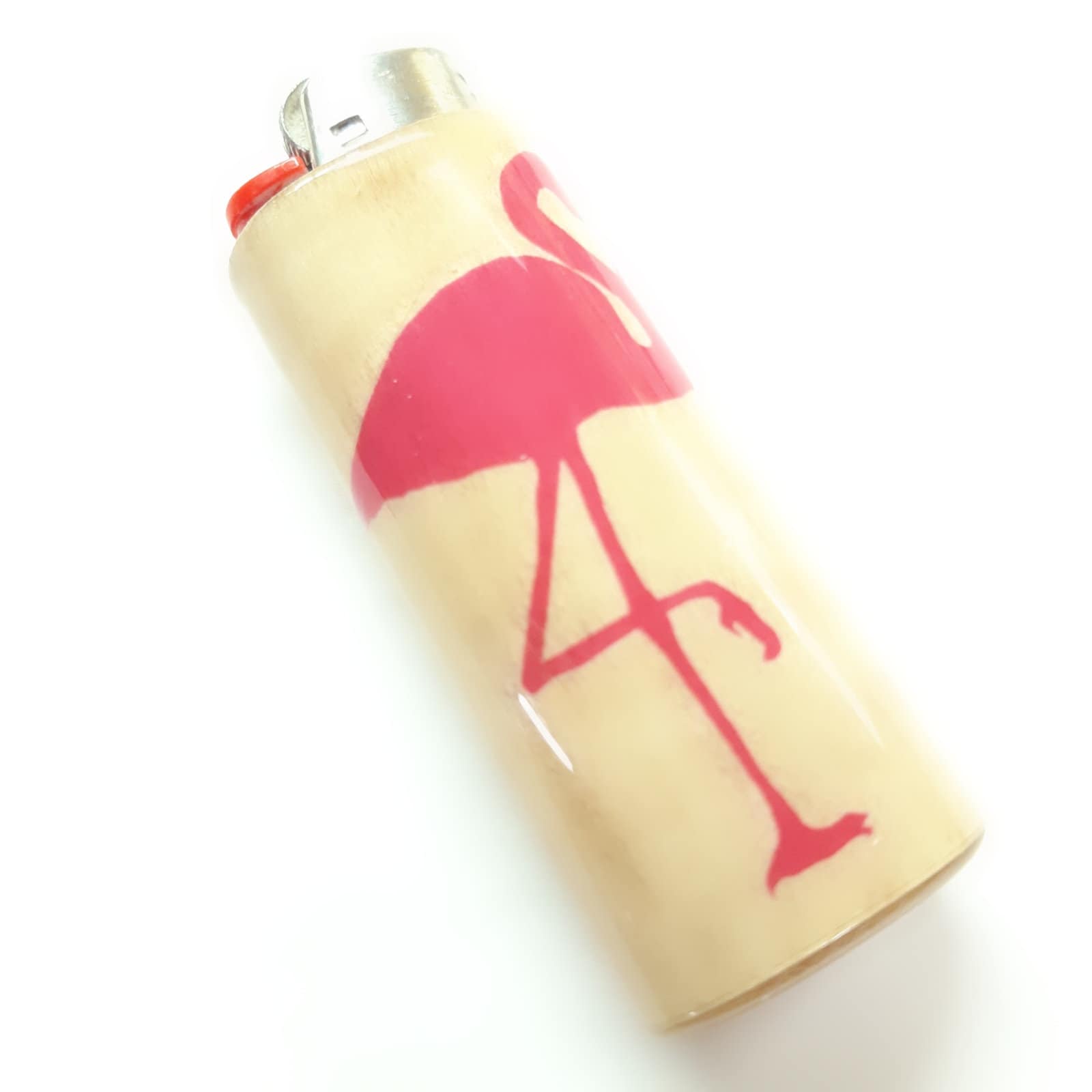 Beige lighter with a pink flamingo design on a white background