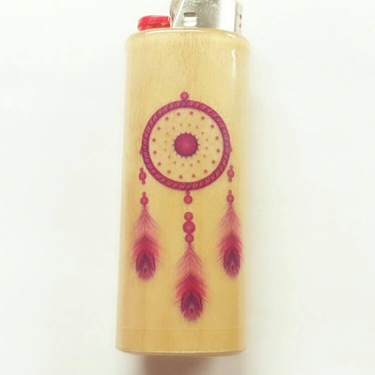Lighter with a dreamcatcher design on a white background