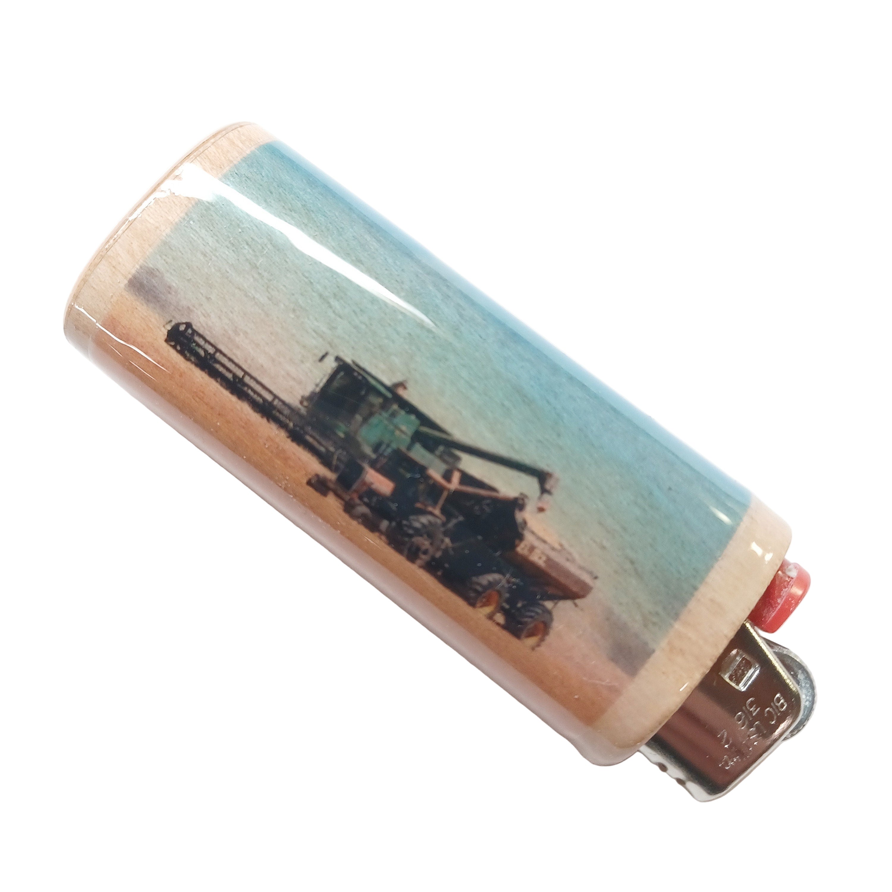 Lighter with a printed design of a tractor and combine