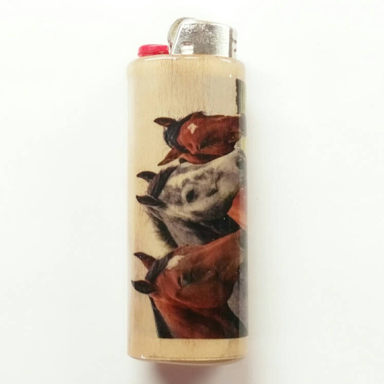 Lighter with a design of horses on a white background