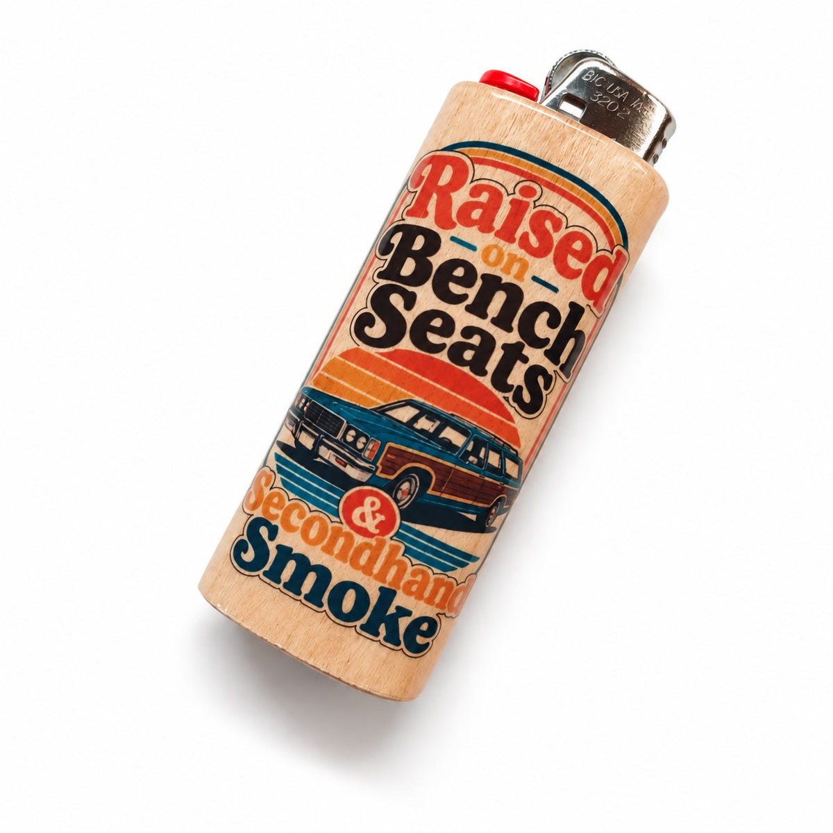 A wooden lighter with a colorful retro graphic that reads 'Raised on Bench Seats & Secondhand Smoke' and shows a vintage station wagon, photographed on a white background.
