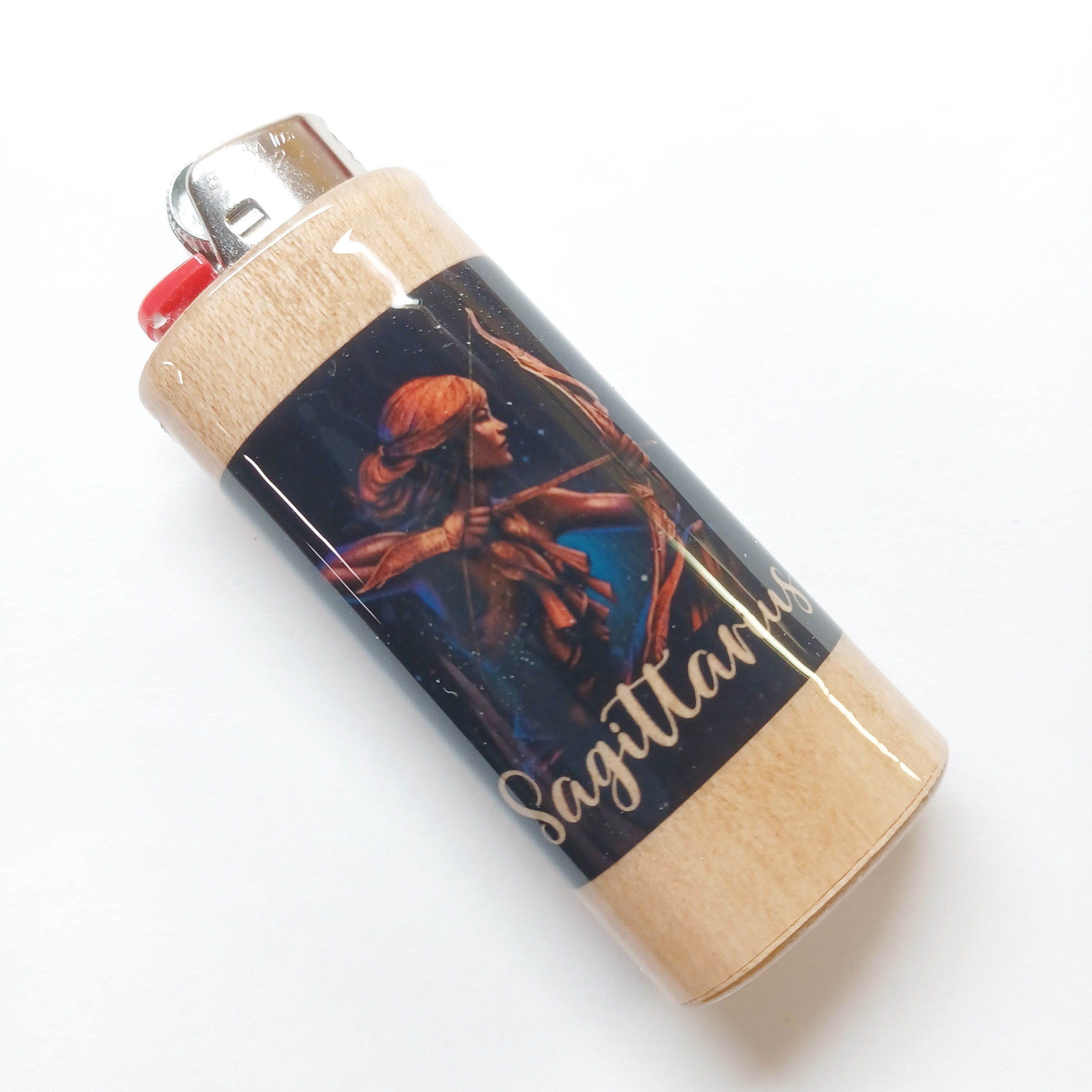 Lighter with Sagittarius zodiac design on a white background