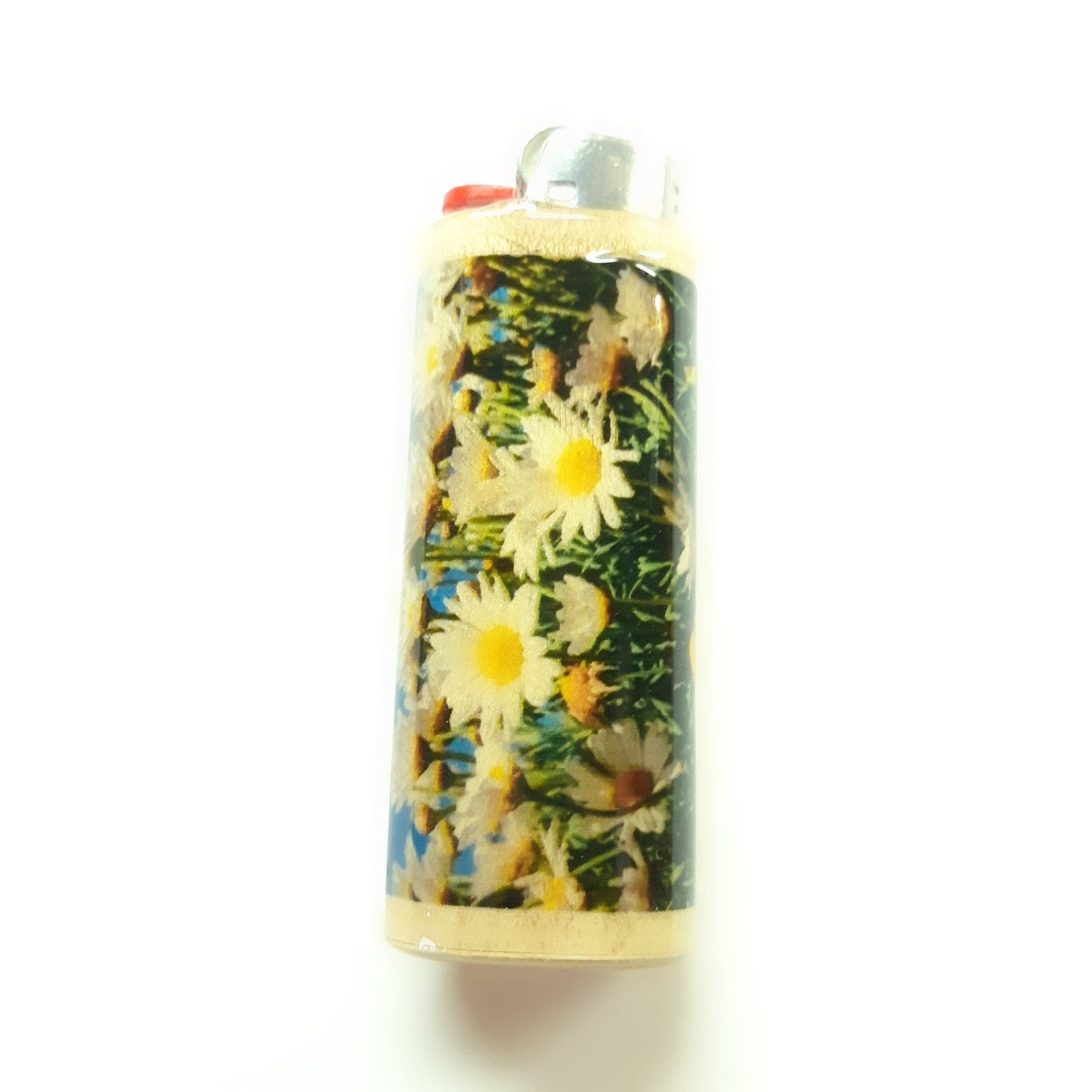 Lighter with daisy design on a white background