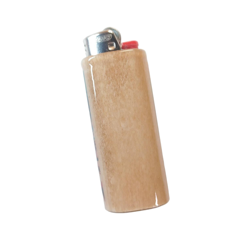 Beige lighter with metallic top on a white background