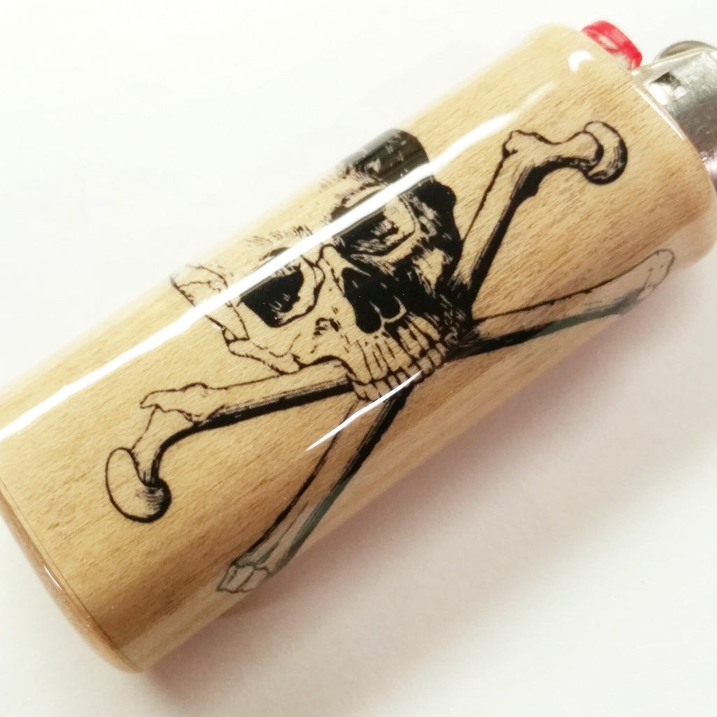 Wooden lighter with a skull and crossbones design on a white background
