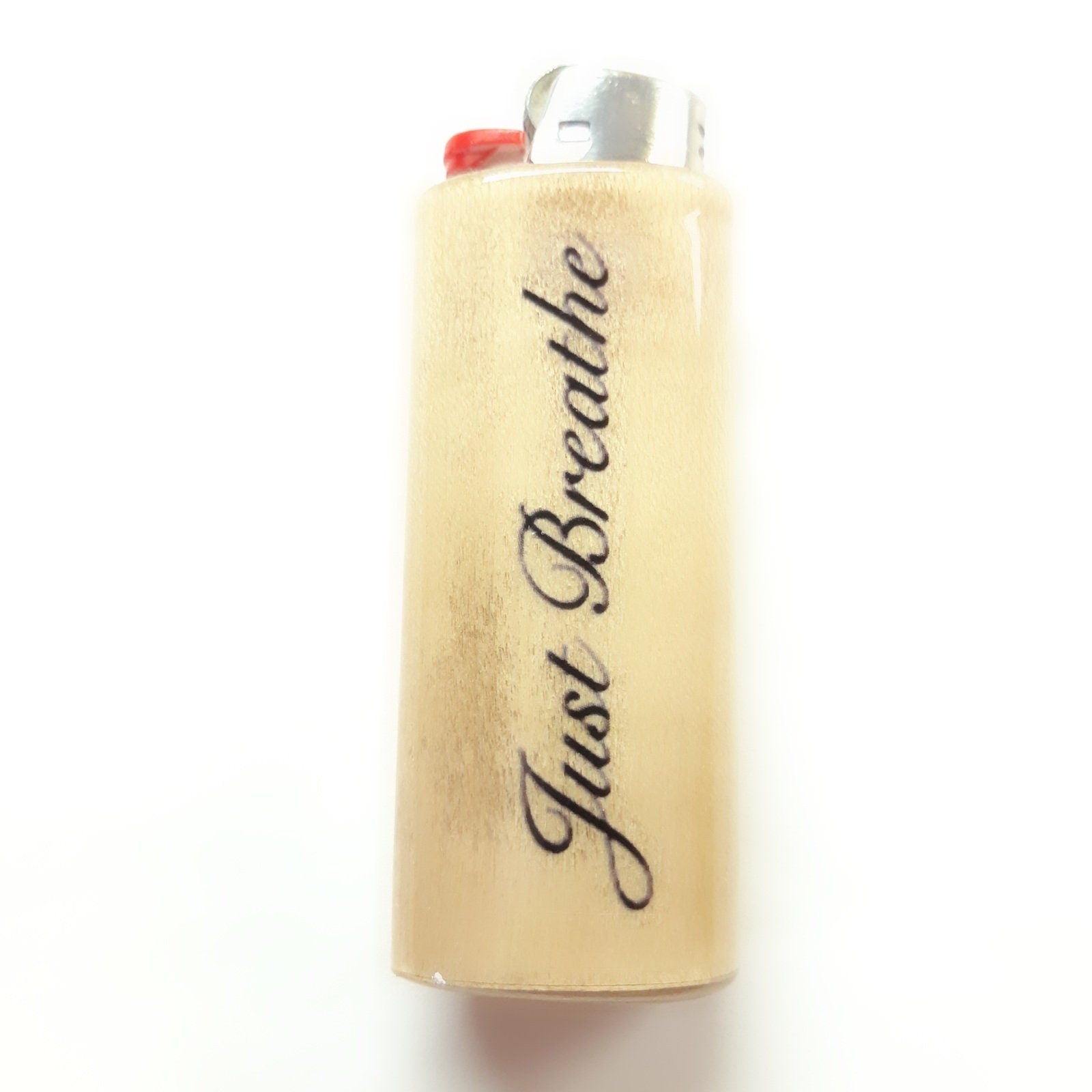 Lighter with 'Just Breathe' text on a white background