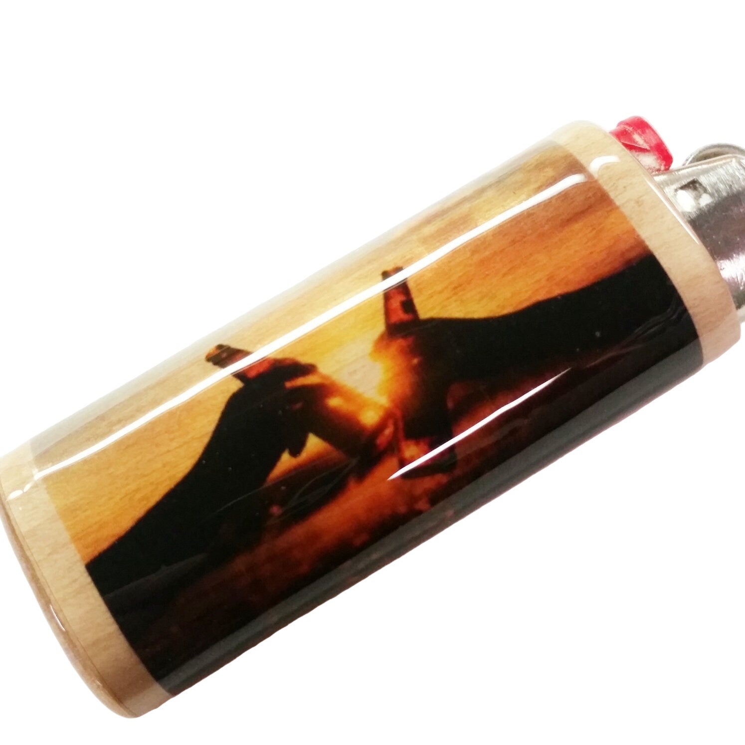 Lighter with a printed design of two people embracing beer bottles at sunset on a white background