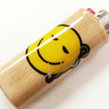 Lighter with a cartoon face design on a white background