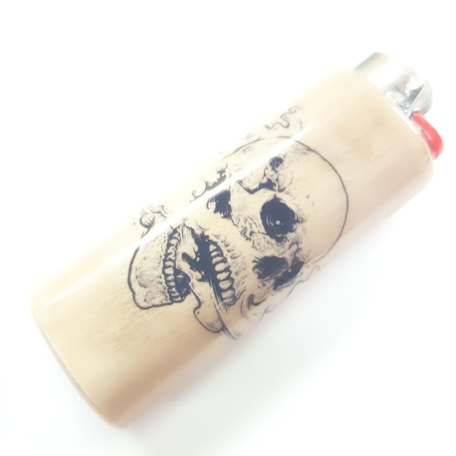 Lighter with a skull design on a white background