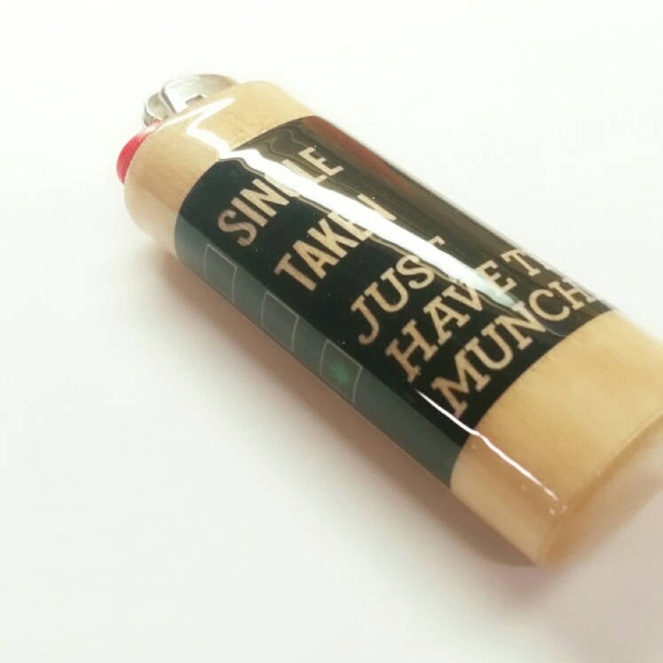 Lighter with humorous text on a white background