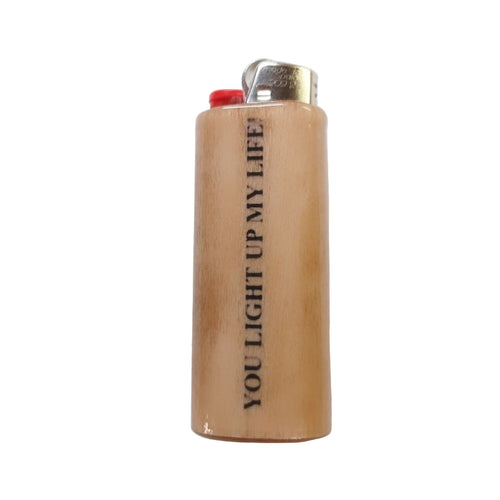 Wooden lighter with 'YOU LIGHT UP MY LIFE' text on a white background