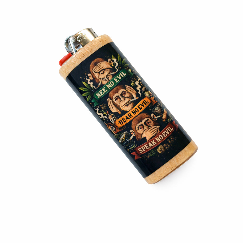 Lighter with 'See No Evil, Hear No Evil, Speak No Evil' design on a white background