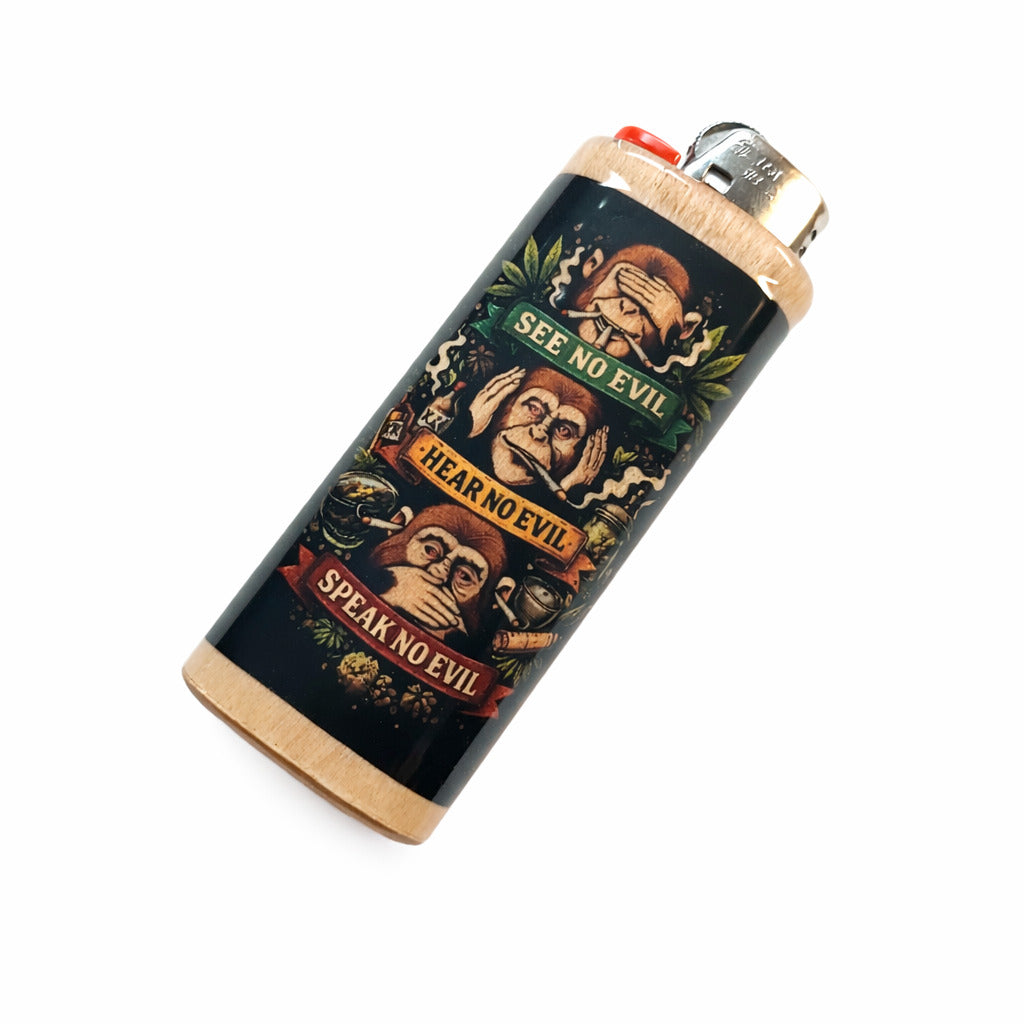 Lighter with 'See No Evil, Hear No Evil, Speak No Evil' design on a white background
